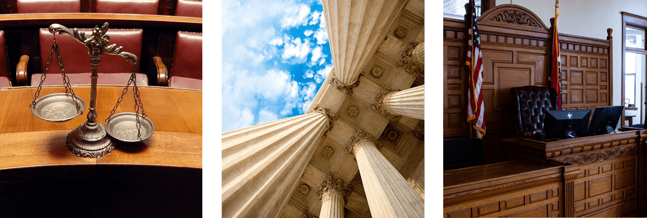 A view of the top of an old building with pillars.